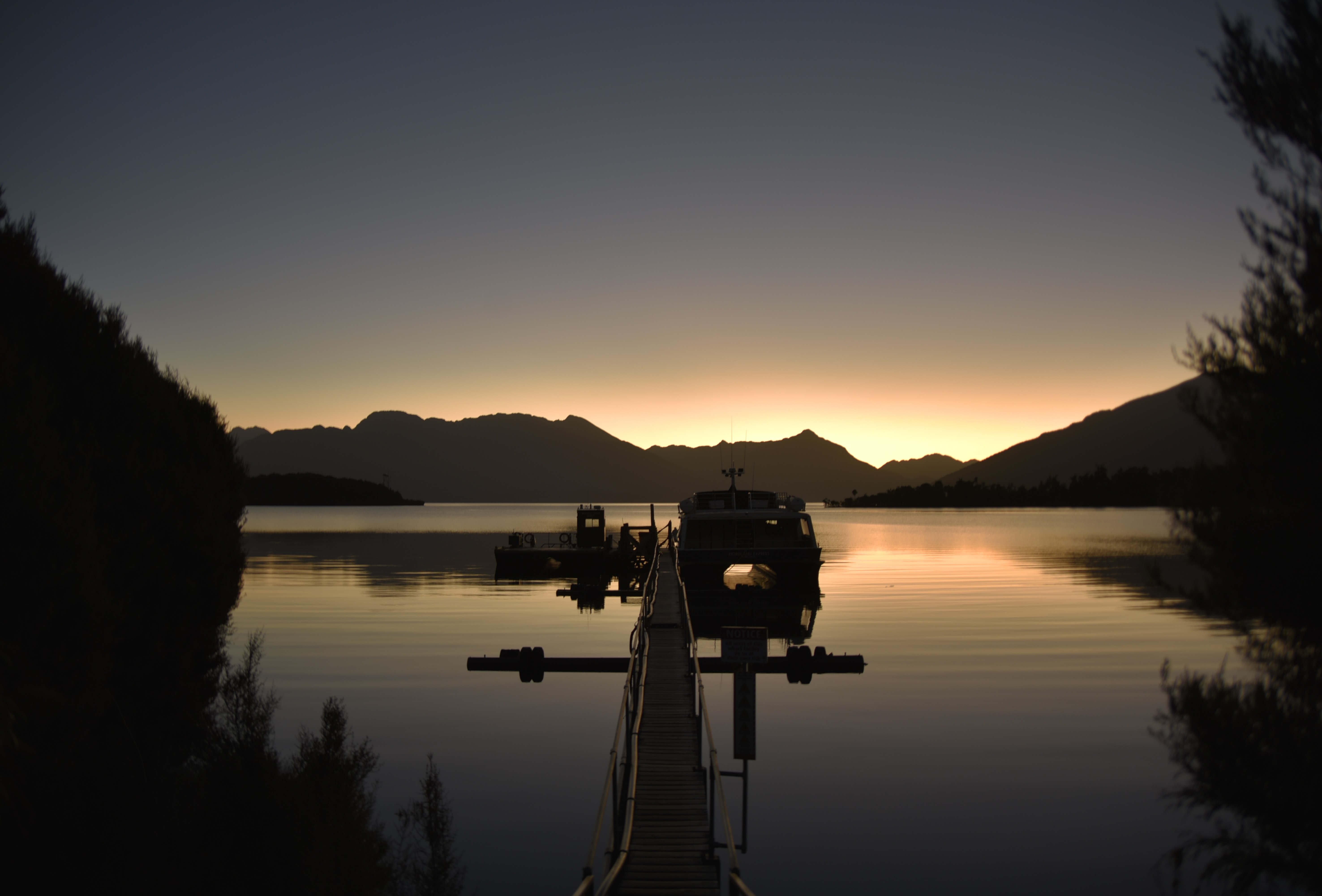 Queenstown, New Zealand — alpine peaks and lake at dusk